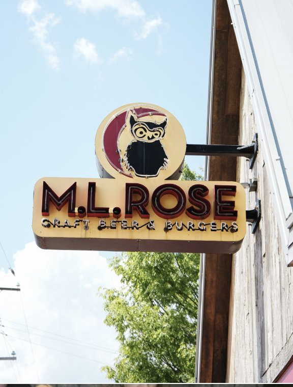M.L.Rose hanging exterior sign