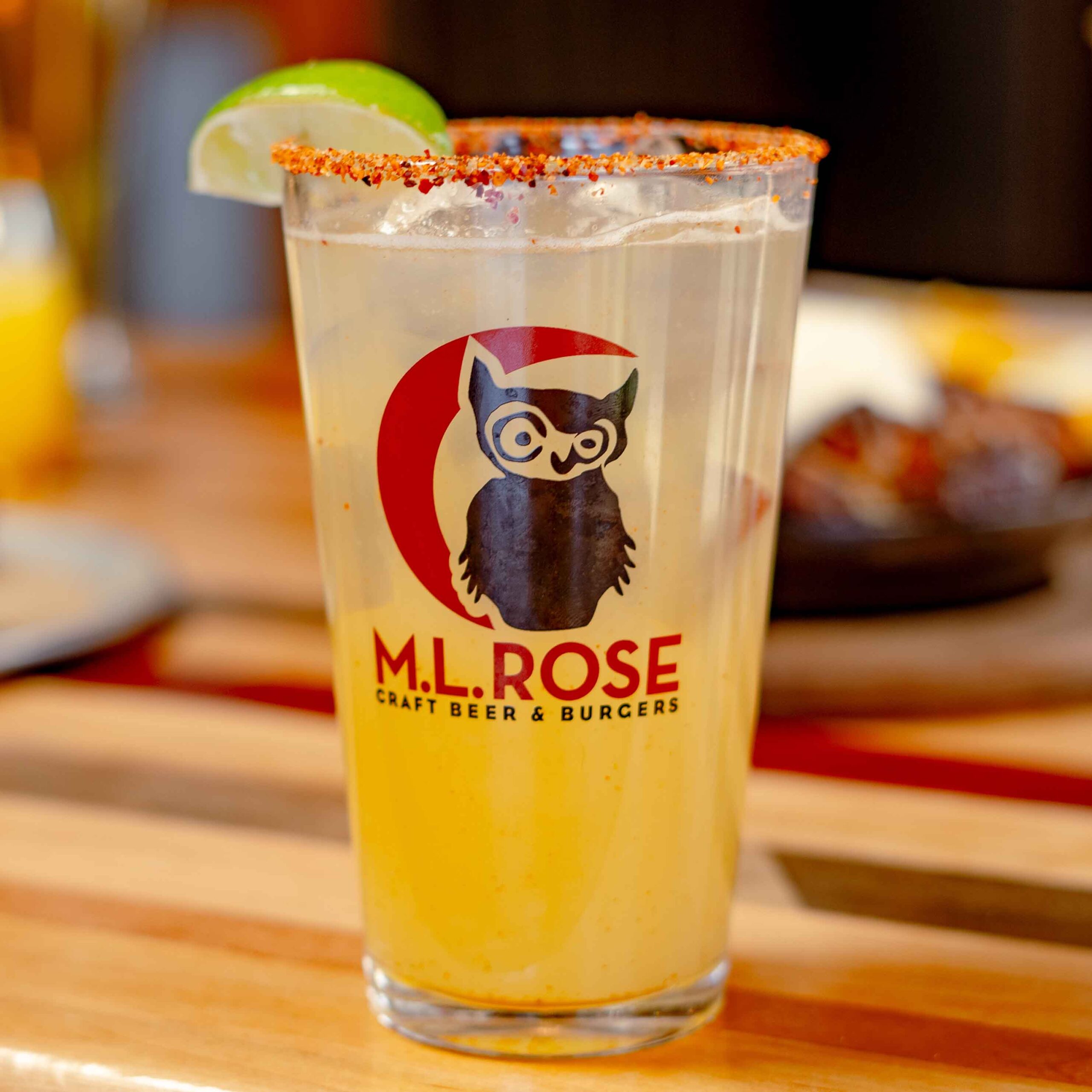 M.L.Rose branded beer served in plastic cup